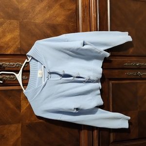 Light blue sweater